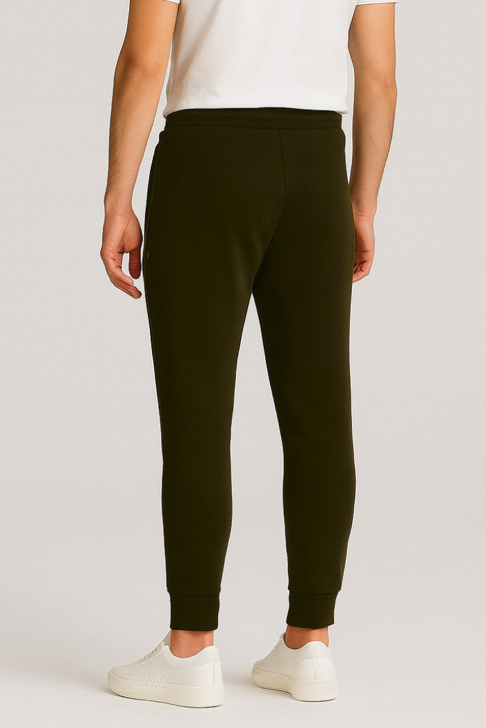 Pantaloni tuta verde militare con patch gommata e fondo elasticizzato