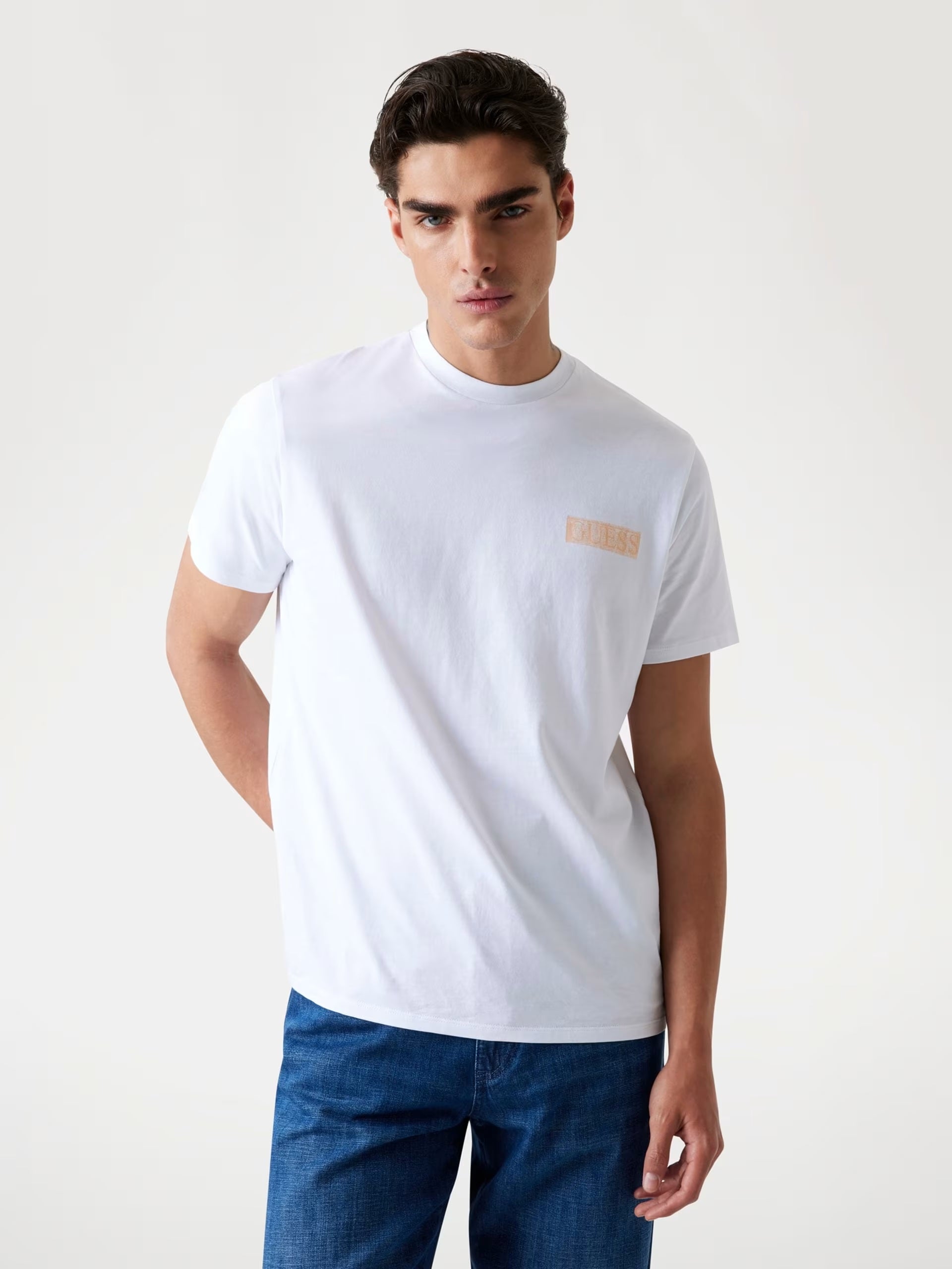 T-shirt Bianca con Logo Oversize arancione sul Retro
