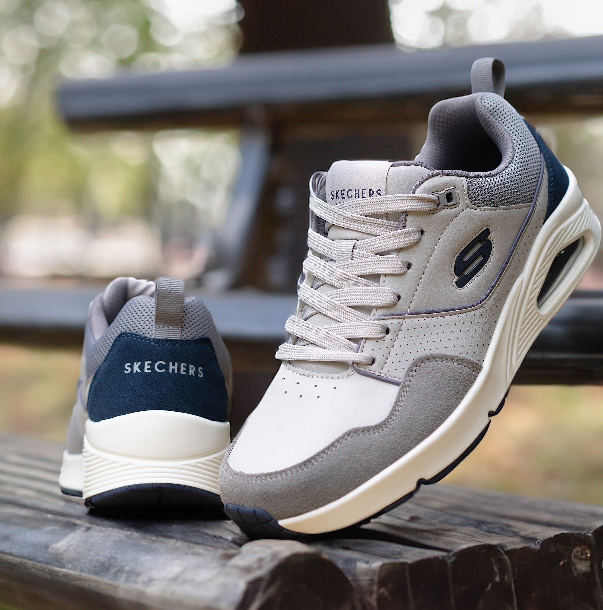 Sneakers Grigie con Inserti in Pelle Scamosciata e Cuscinetto Air