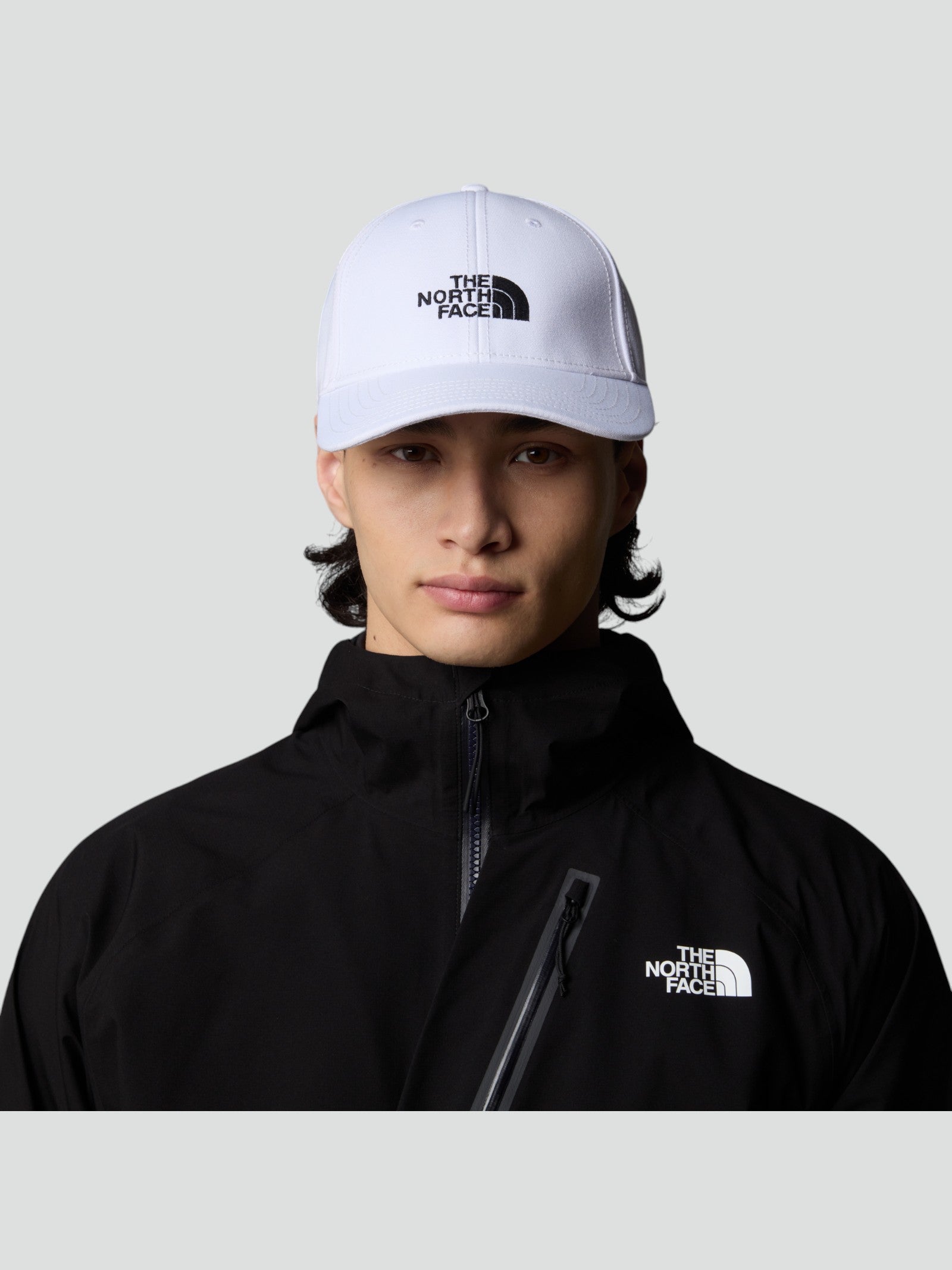 Cappellino Bianco "The North Face" con Logo Ricamato nero