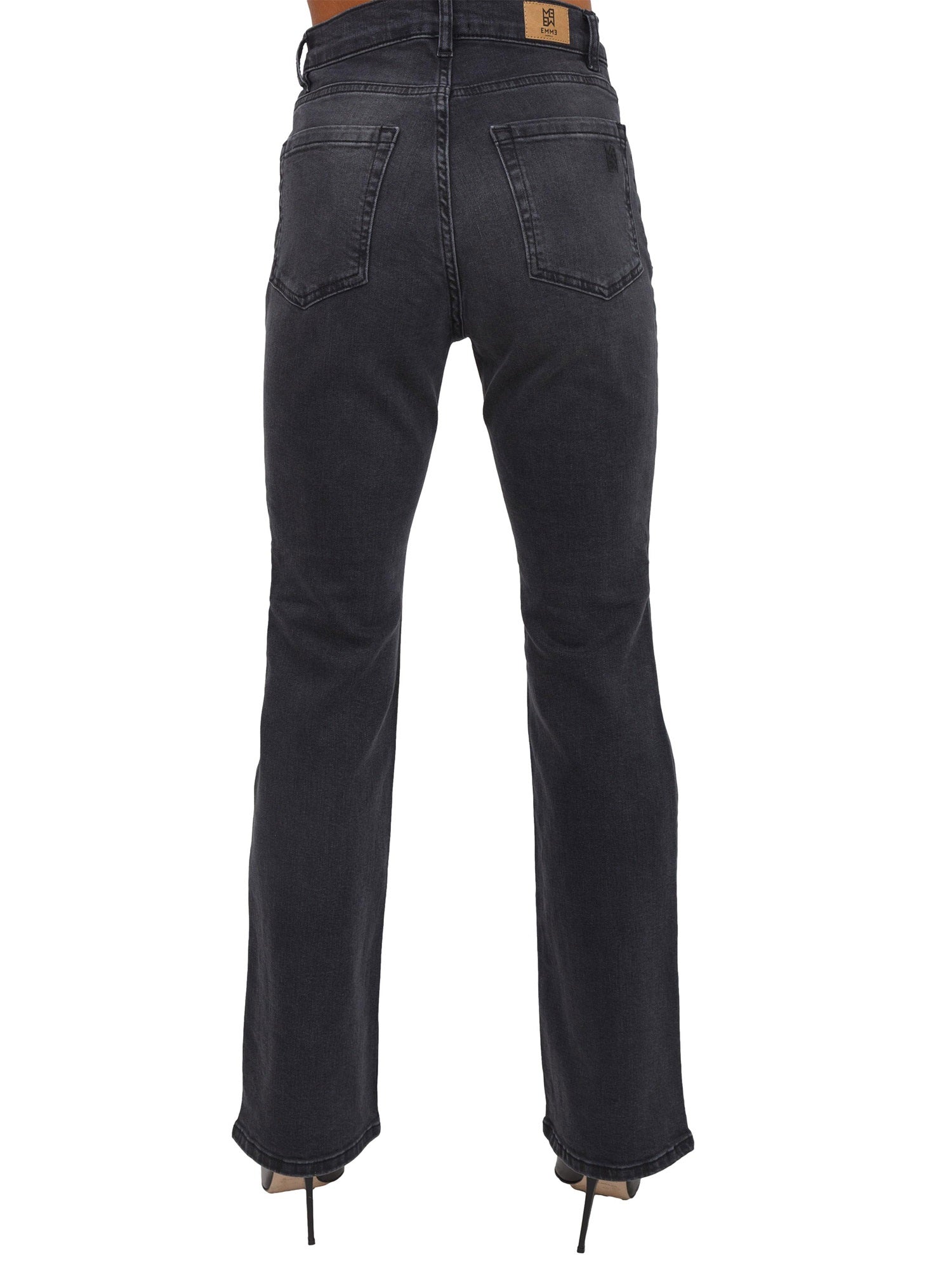 Jeans "Felce" in denim nero pulito slim flare 