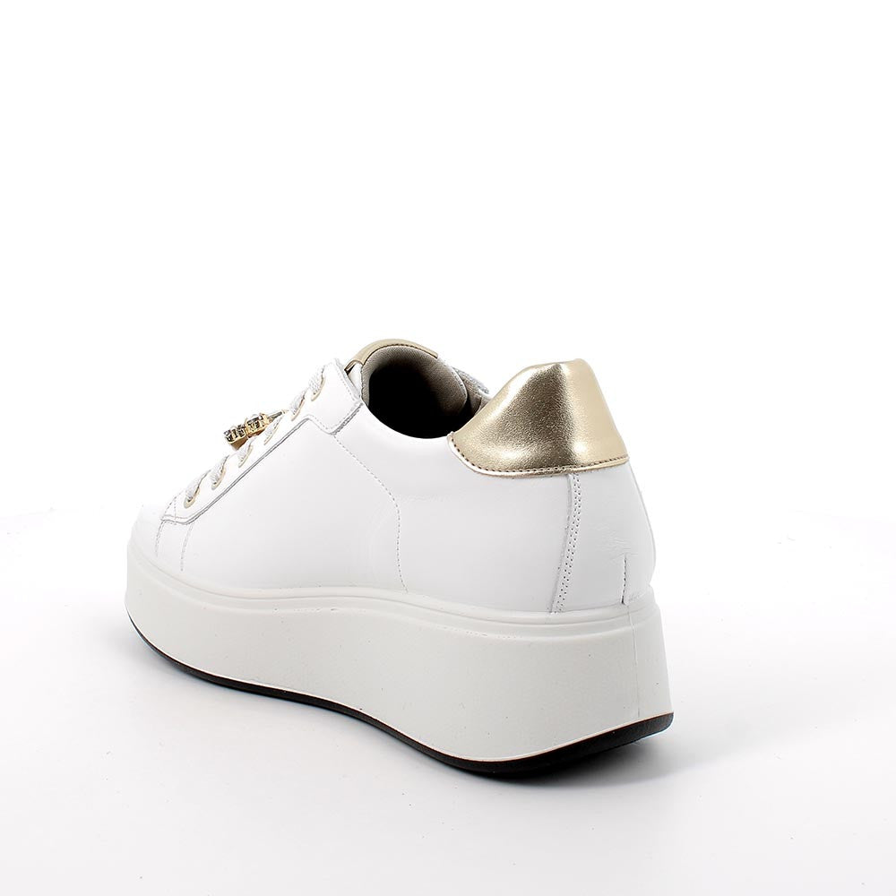 Sneakers con zeppa bianche in pelle con lacci e suola estraibile 