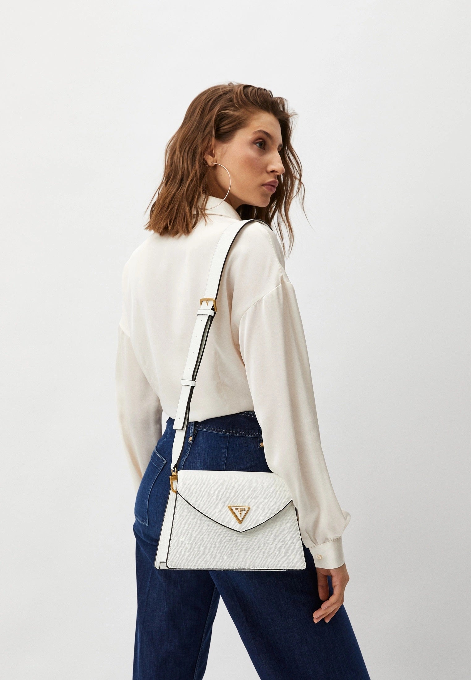 Borsa "James Girlfriend" bianca con tracolla regolabile e patta 
