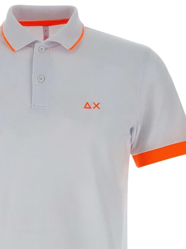 Polo Bambino bianca con Profili Fluo arancioni e Logo a Contrasto 
